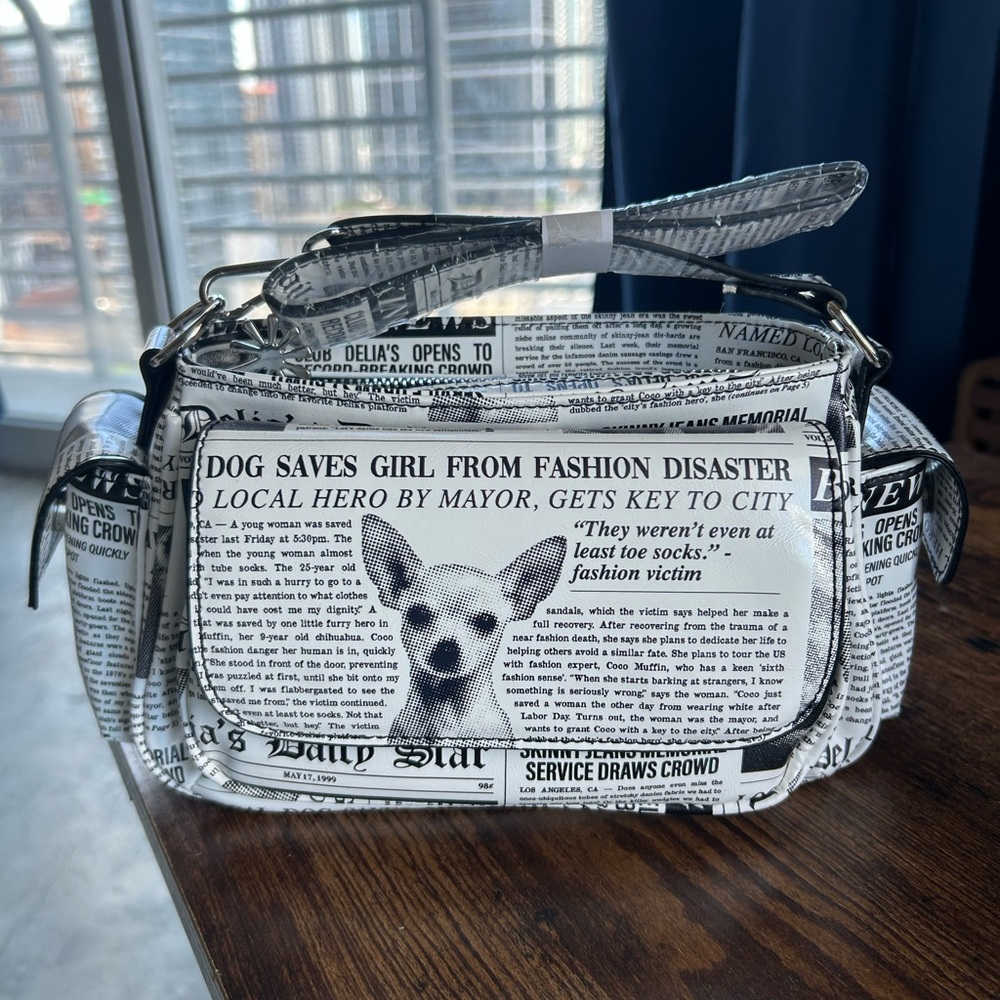 Dolls Kill Delia’s BREAKING NEWS SHOULDER BAG Crossbody Bag - Paris Hilton